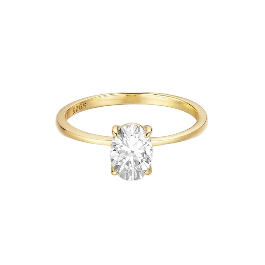 Gold ring with a diamond on a white background